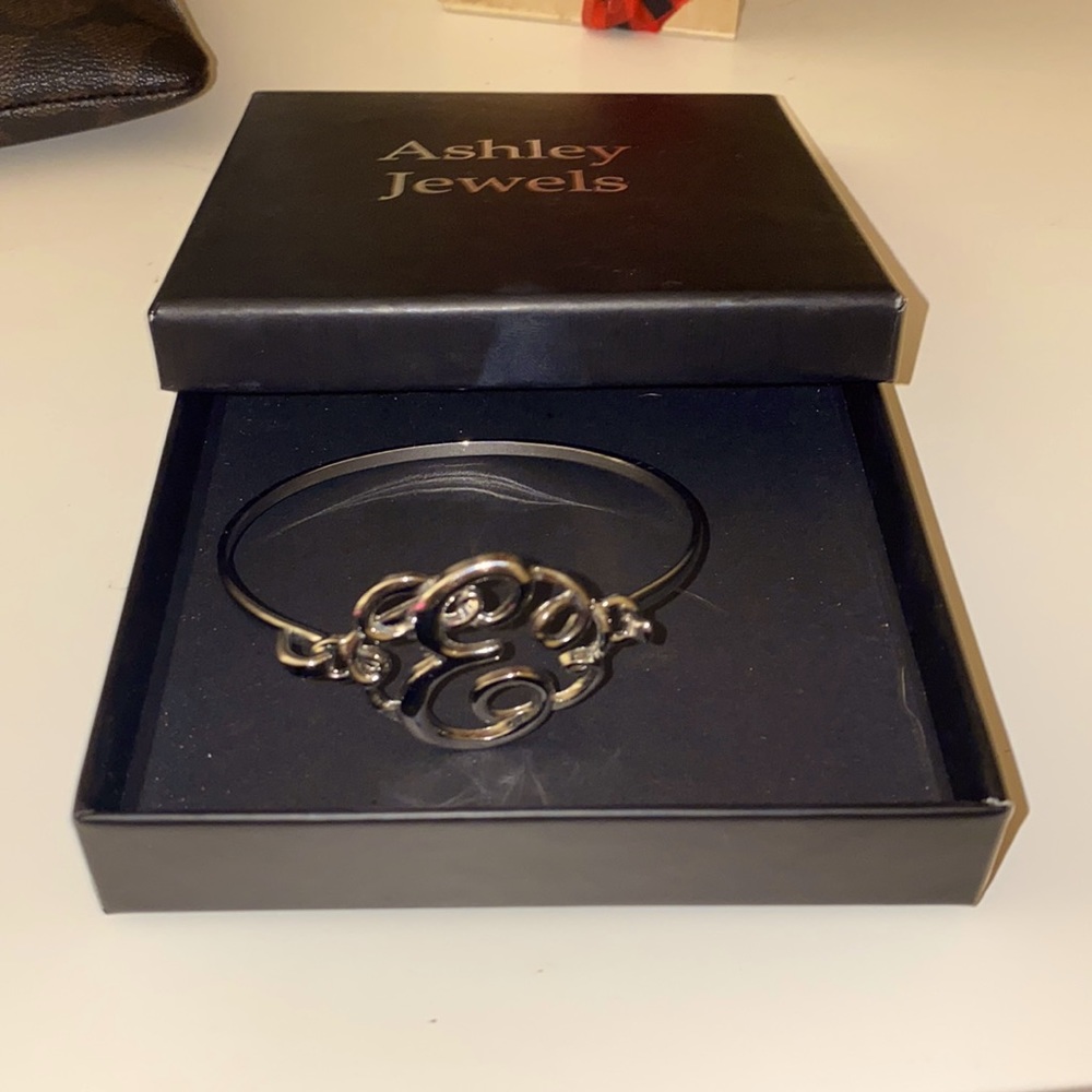 “E” Monogram silver bracelet.